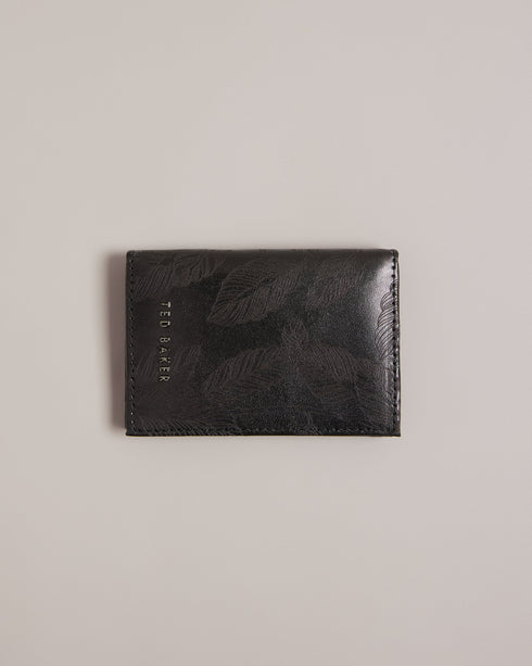 WINCARD-Wallets-Upgrade your accessories with this sleek card holder made from top grain leather. WINCARD features a laser-etched leaf design that adds a touch of nature-inspired elegance. It's got plenty of card slots to stash your cash and is finished with shiny logo hardware. Bifold card holder Top grain leather Logo hardware Laser etched leaf design Card slots Dimensions: 7.5cm x 10cm x 1cm- Ted Baker Romania